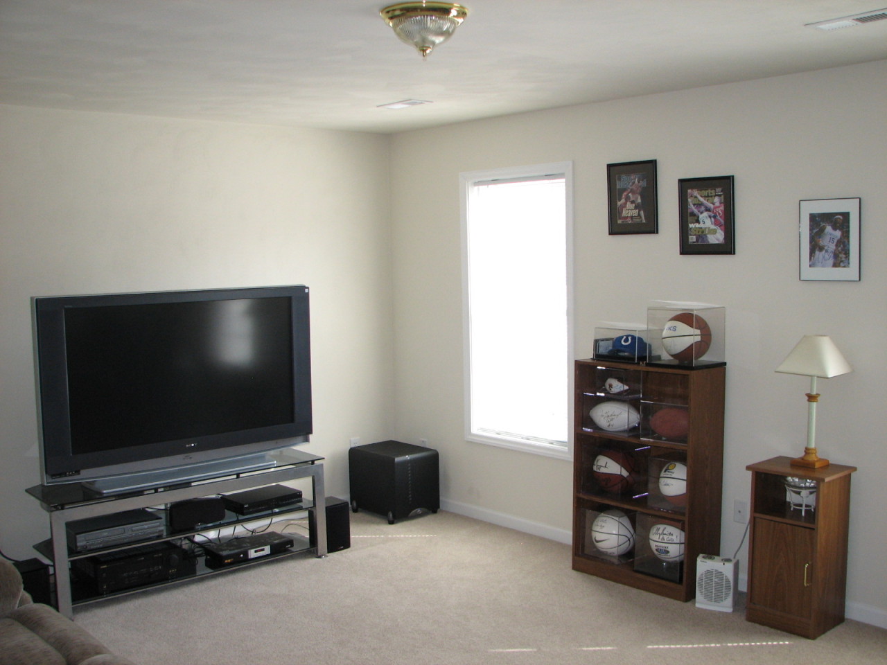 1715 Meadows Road Vinton, VA 24179 - Photo 26 of 37 a living room with furniture and a flat screen tv
