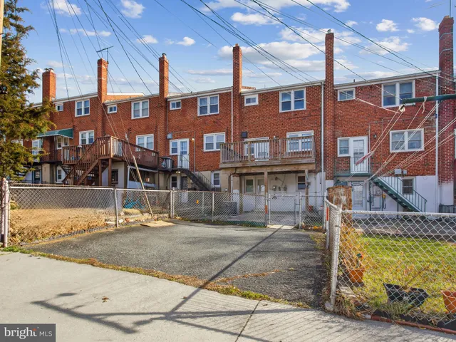 a front view of a building with street view