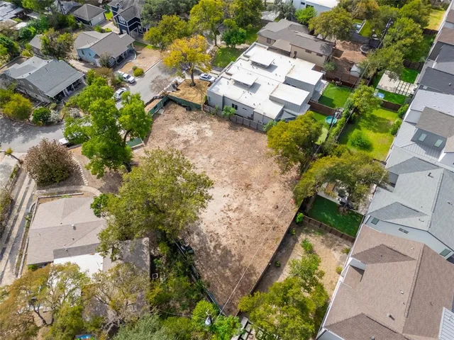 an aerial view of residential house with outdoor space