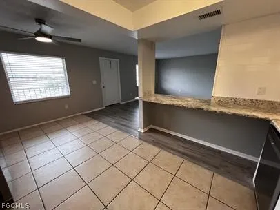 a view of an empty room and window