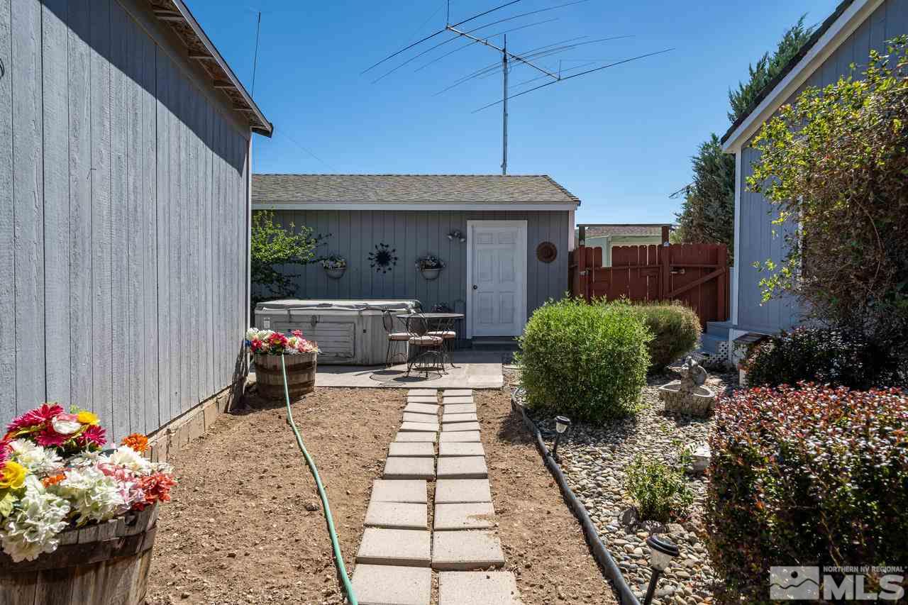 15030 Vega Street Reno, NV 89521 - Photo 27 of 29 a view of a chairs and tables in the patio