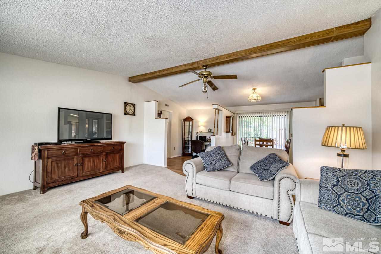 15030 Vega Street Reno, NV 89521 - Photo 5 of 29 a living room with furniture and a couch