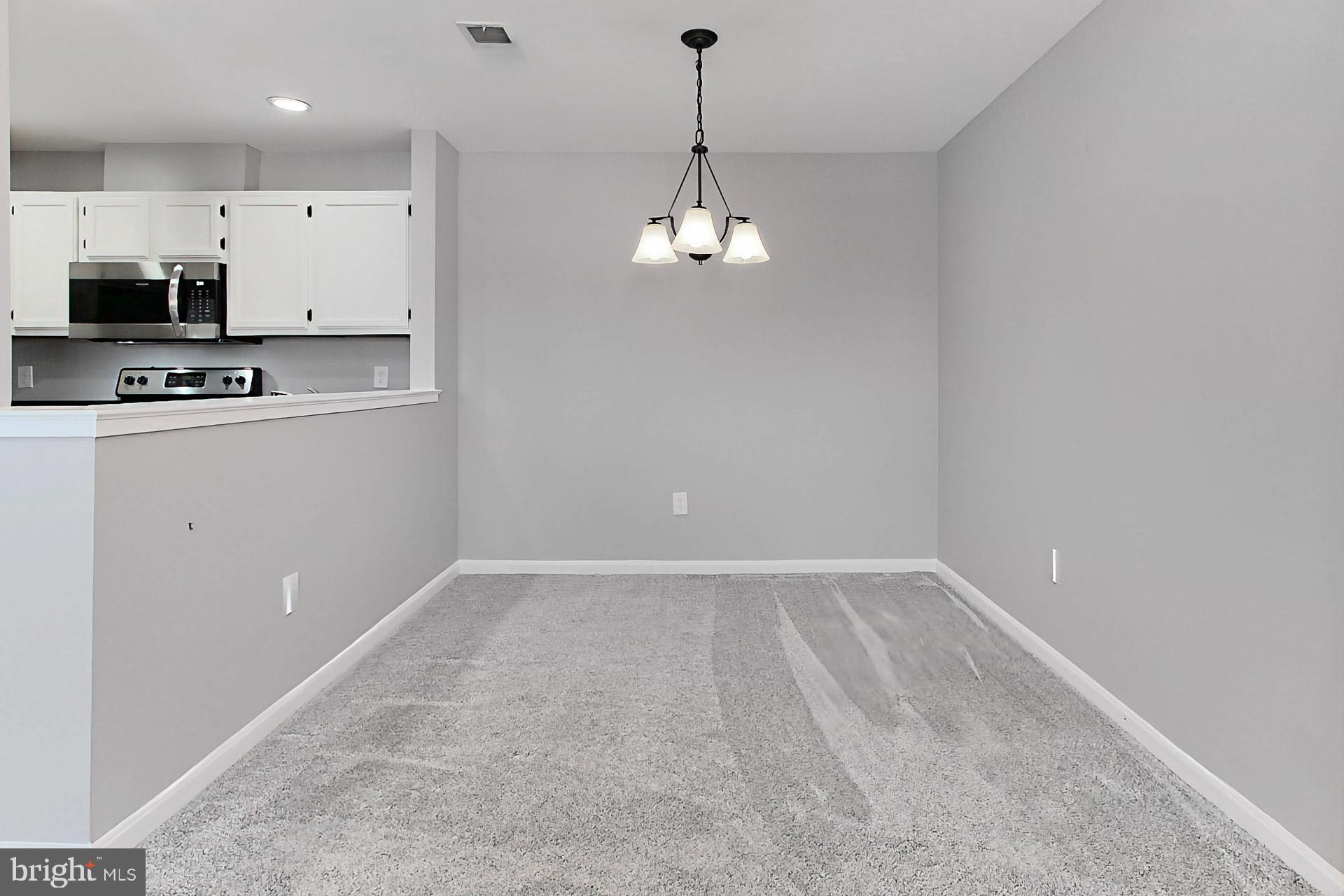 7712 D Lexton Place, Unit 92 Springfield, VA 22152 - Photo 8 of 35 Off the kitchen is the perfect area to entertain!