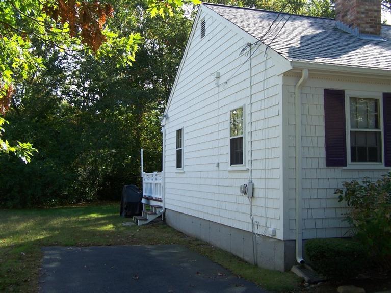 157 Compass Circle Hyannis, MA 02601 - Photo 2 of 21 a view of a house with a yard