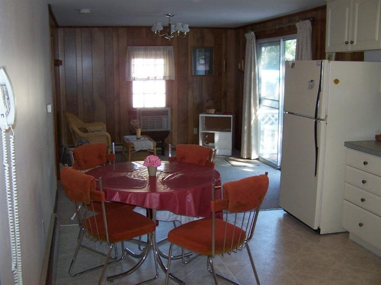 157 Compass Circle Hyannis, MA 02601 - Photo 10 of 21 a dining room with furniture and window