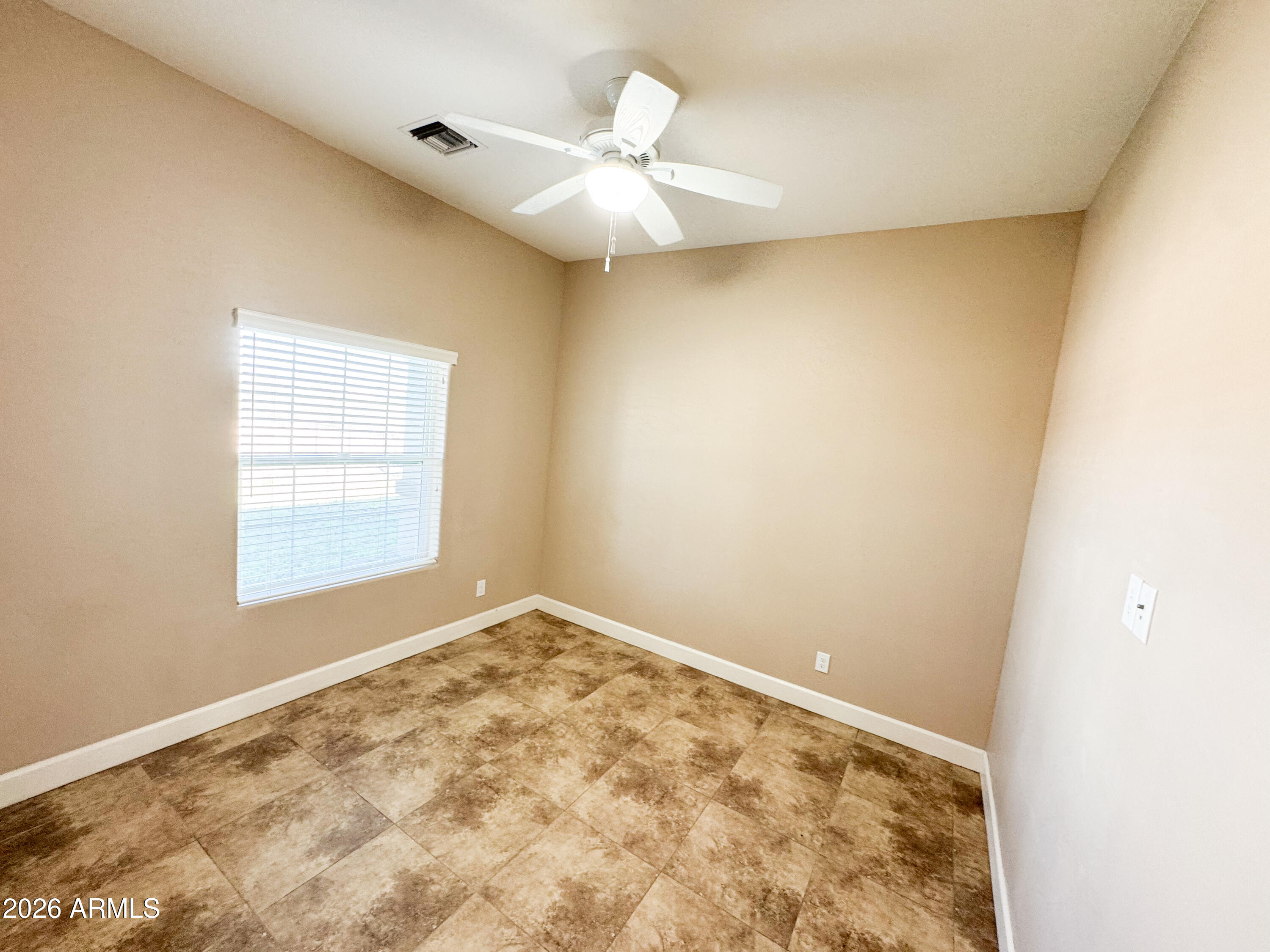 315 North 1720th Street West Pima, AZ 85543 - Photo 16 of 25 a view of an empty room and window