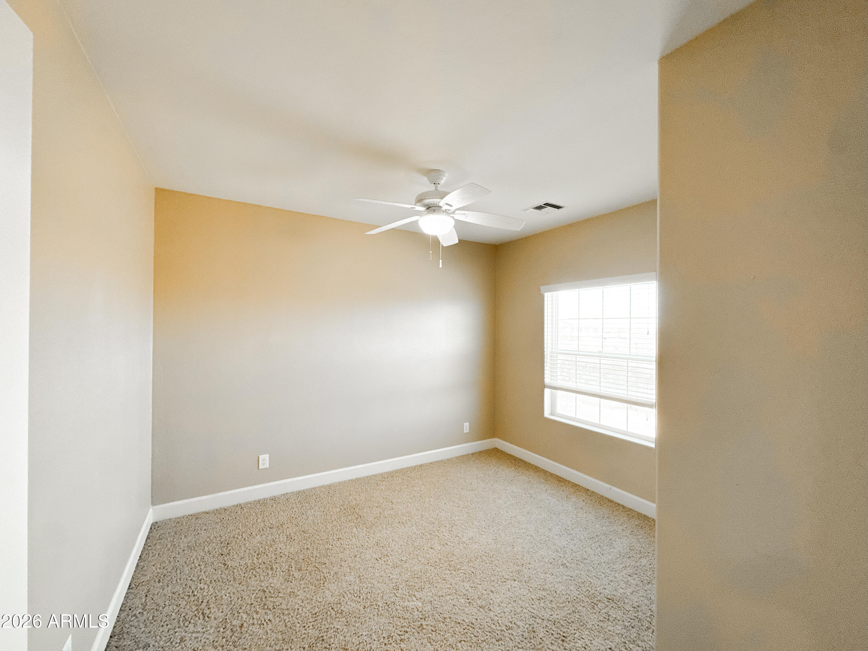 315 North 1720th Street West Pima, AZ 85543 - Photo 20 of 25 an empty room with a window