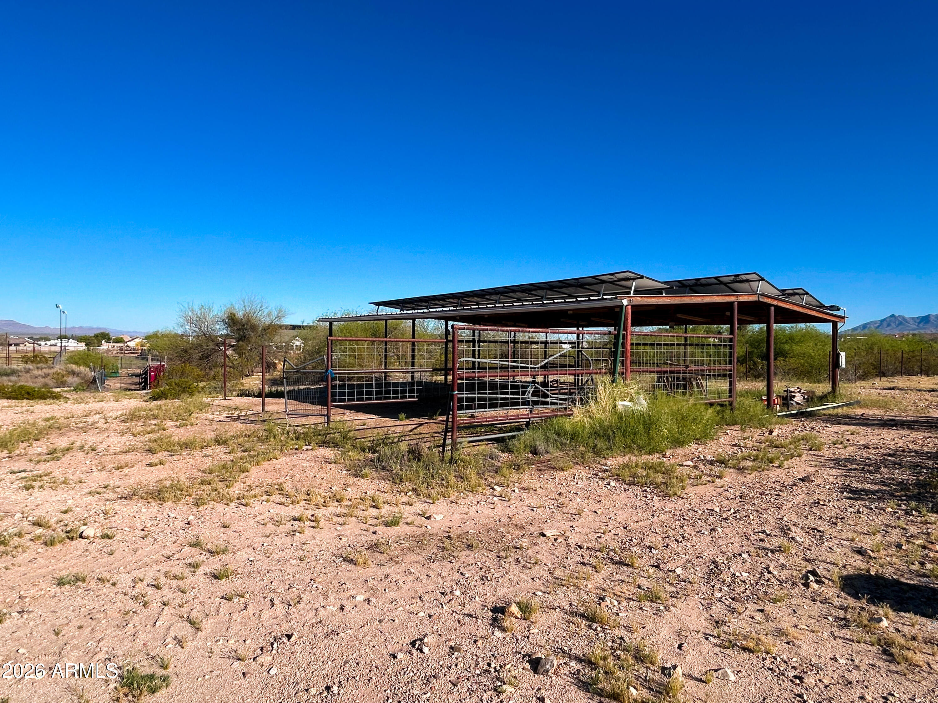 315 North 1720th Street West Pima, AZ 85543 - Photo 4 of 25 a view of a house with a yard