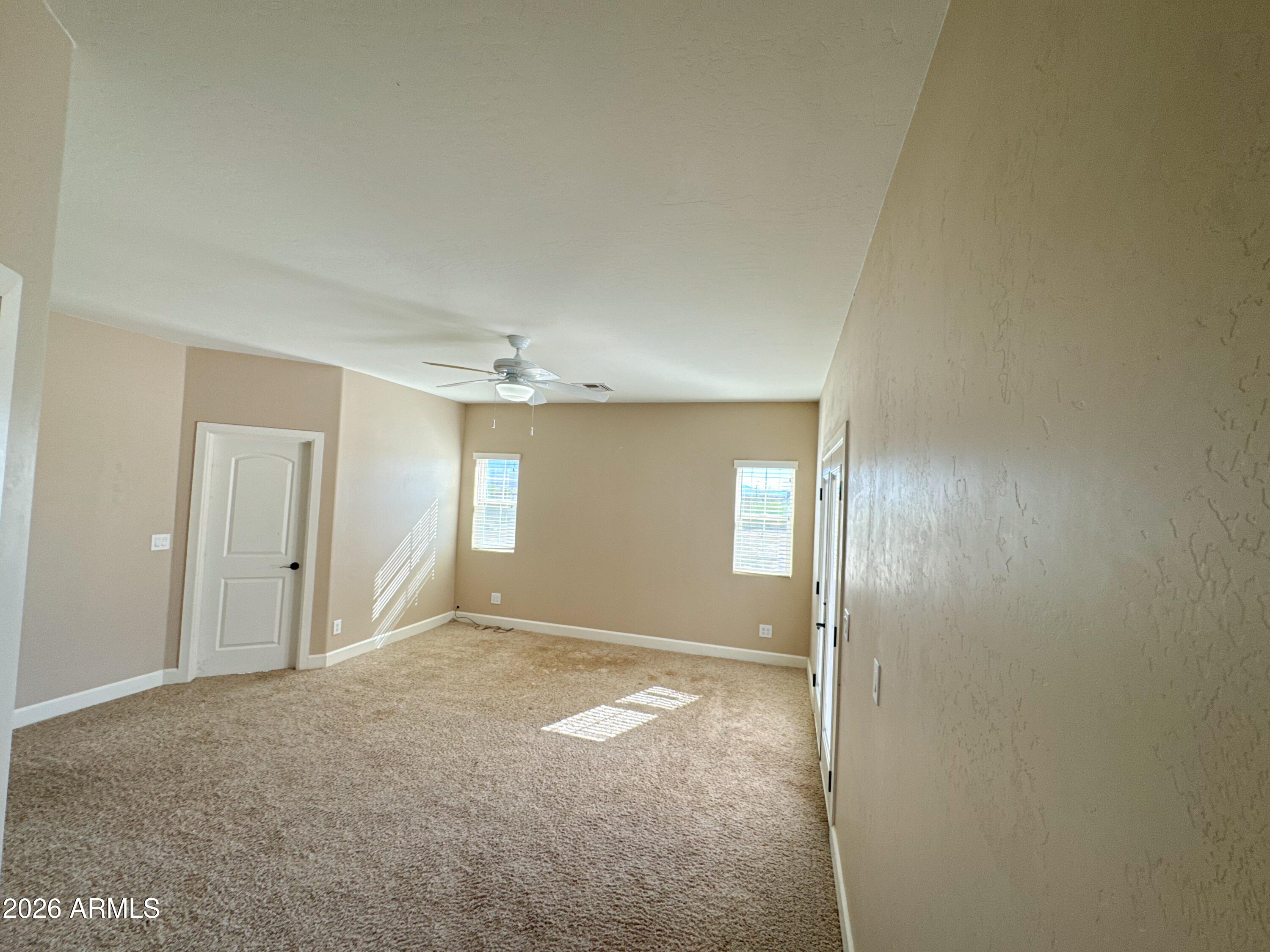 315 North 1720th Street West Pima, AZ 85543 - Photo 9 of 25 a view of an empty room with window and closet area