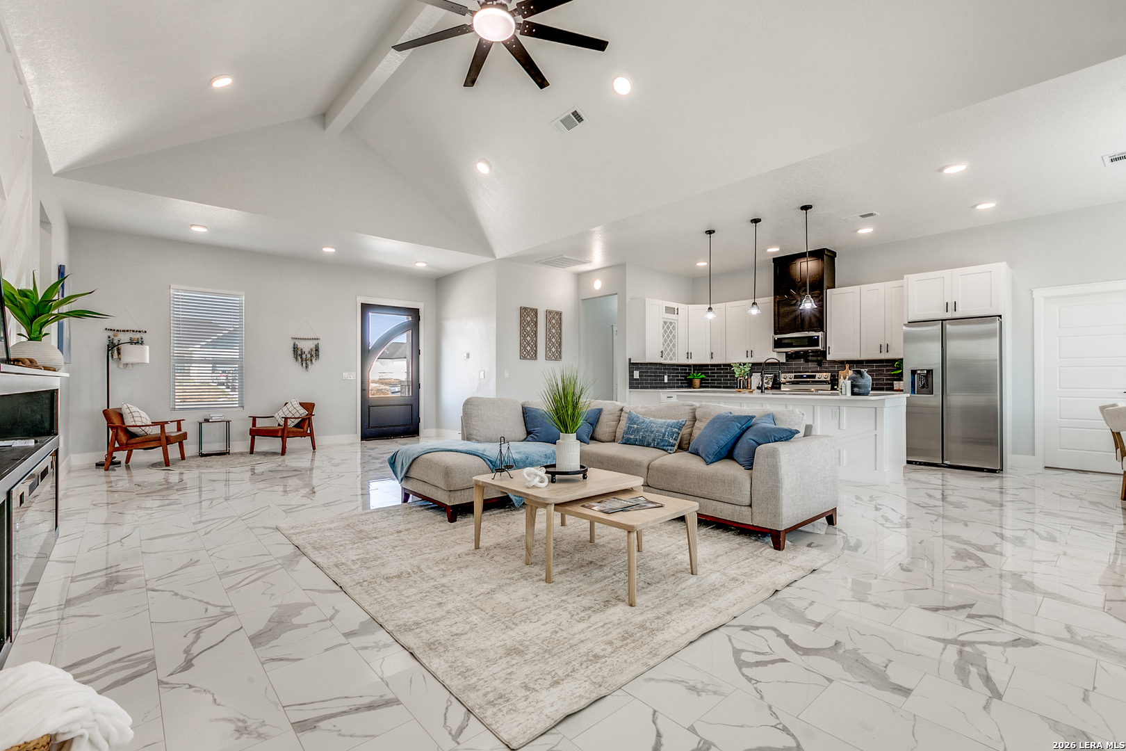 16934 Rancho Atascosa, TX 78002 - Photo 3 of 27 a living room with furniture and kitchen view