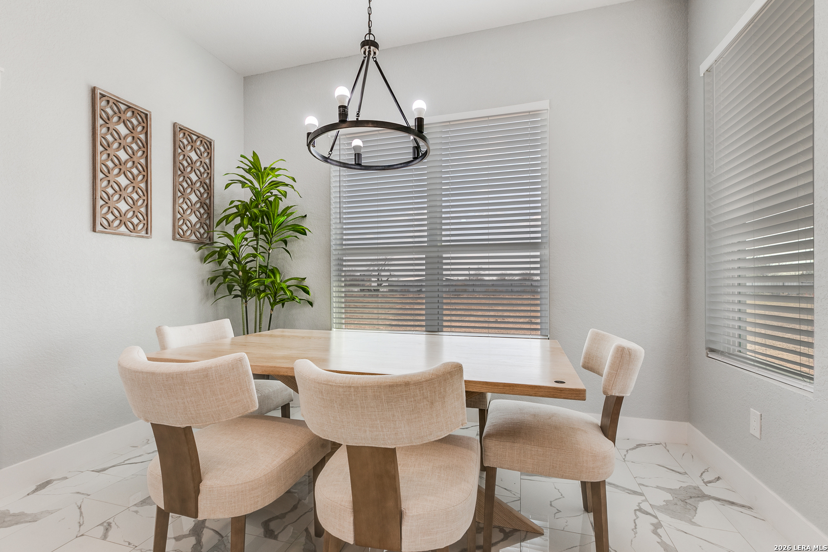 16934 Rancho Atascosa, TX 78002 - Photo 10 of 27 a view of a dining room with furniture and window