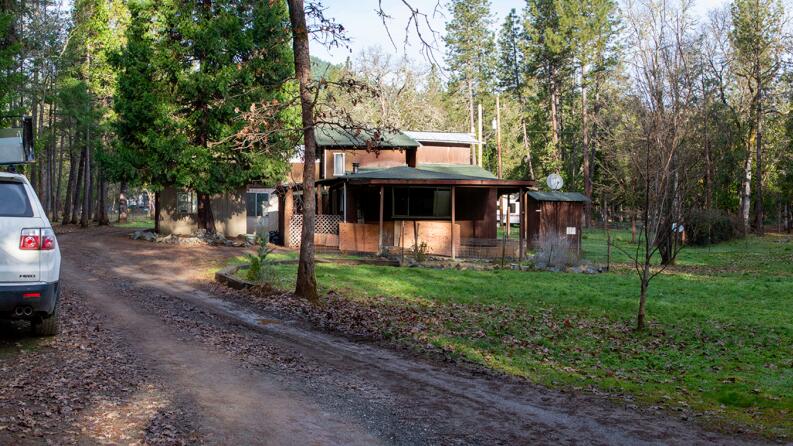 4015 Pleasant Creek Road Rogue River, OR 97537 - Photo 1 of 8 a view of a house with backyard