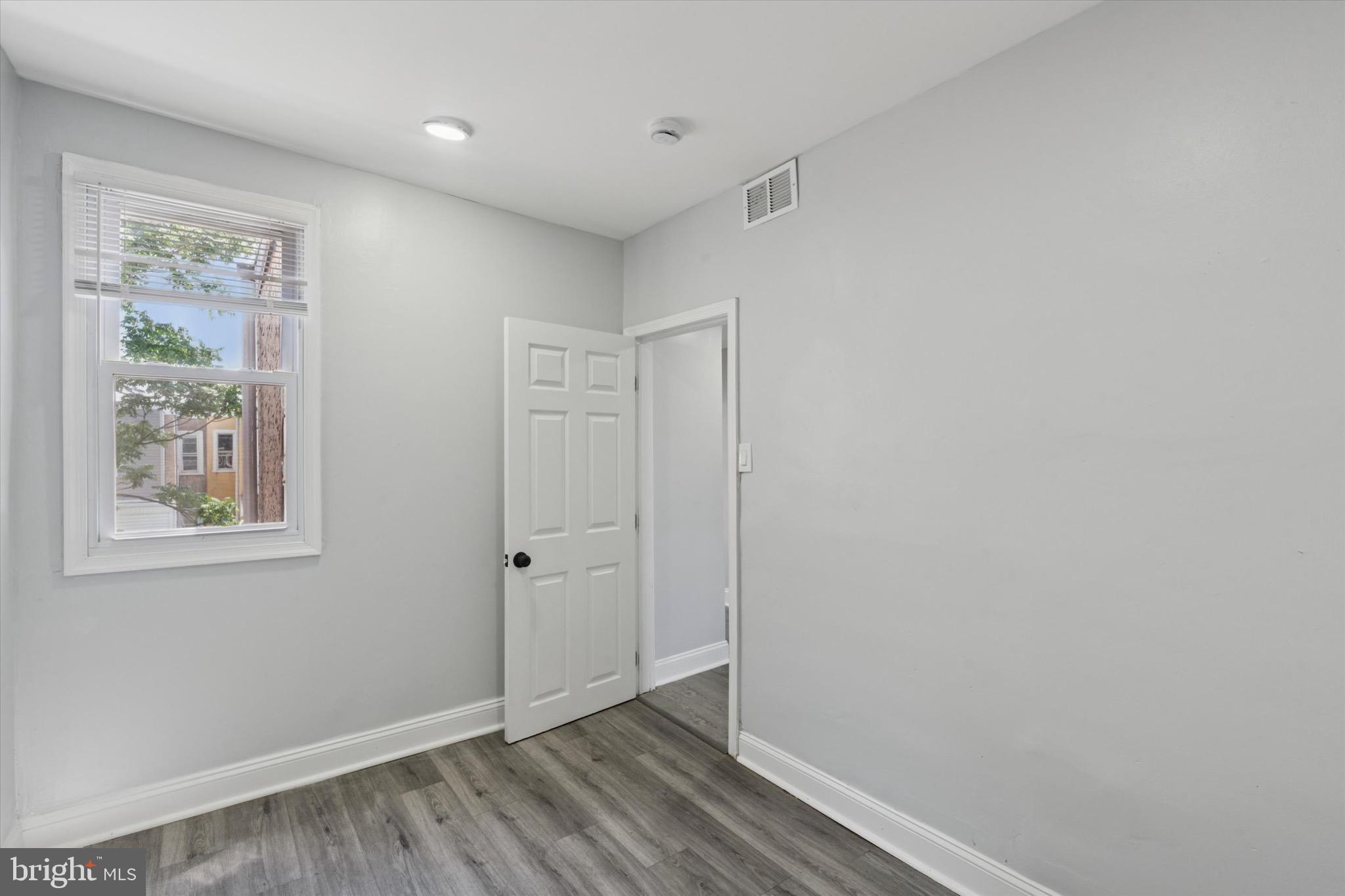 3097 Memphis Street Philadelphia, PA 19134 - Photo 15 of 18 an empty room with windows