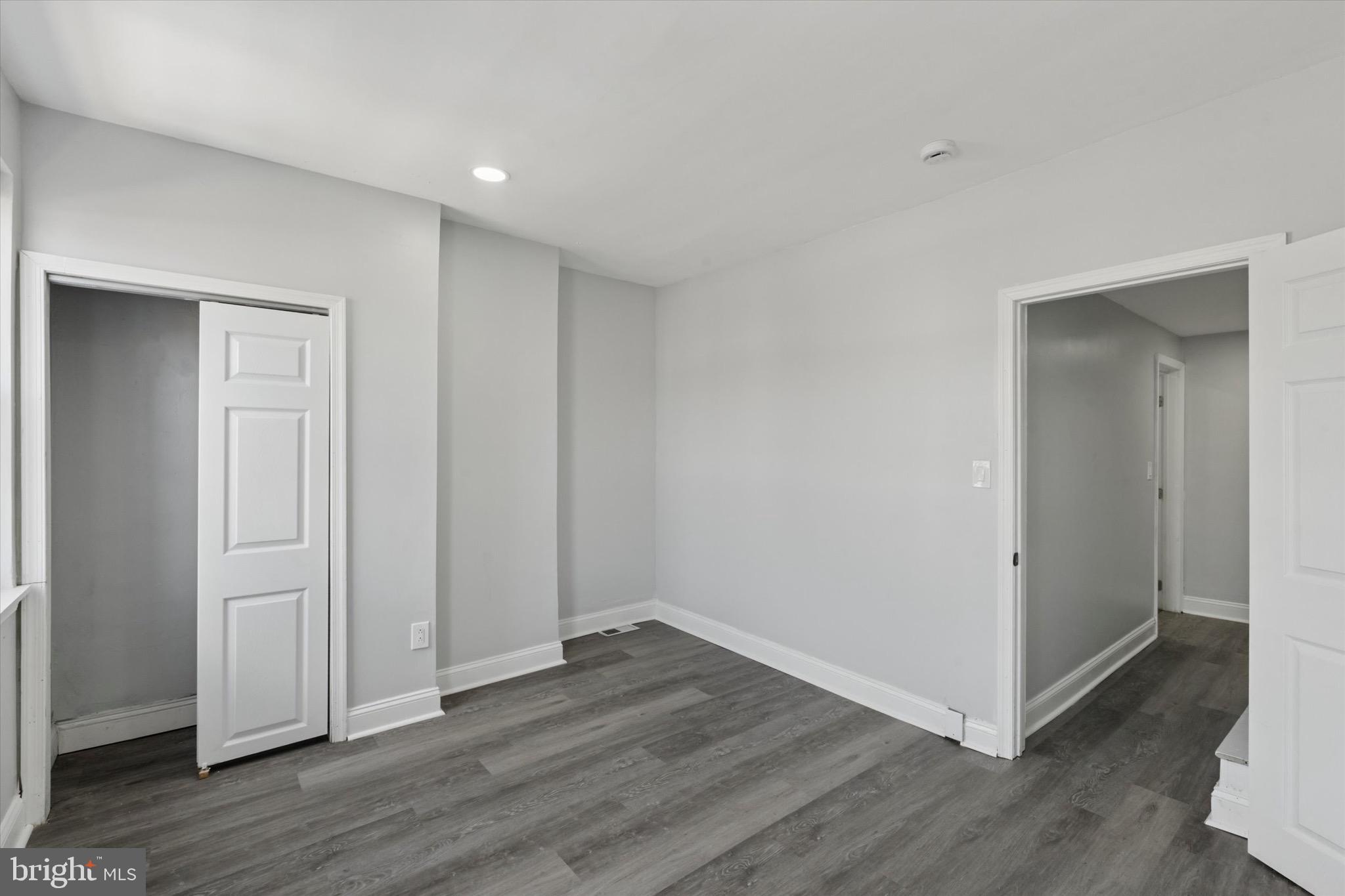 3097 Memphis Street Philadelphia, PA 19134 - Photo 16 of 18 an empty room with wooden floor & closet area