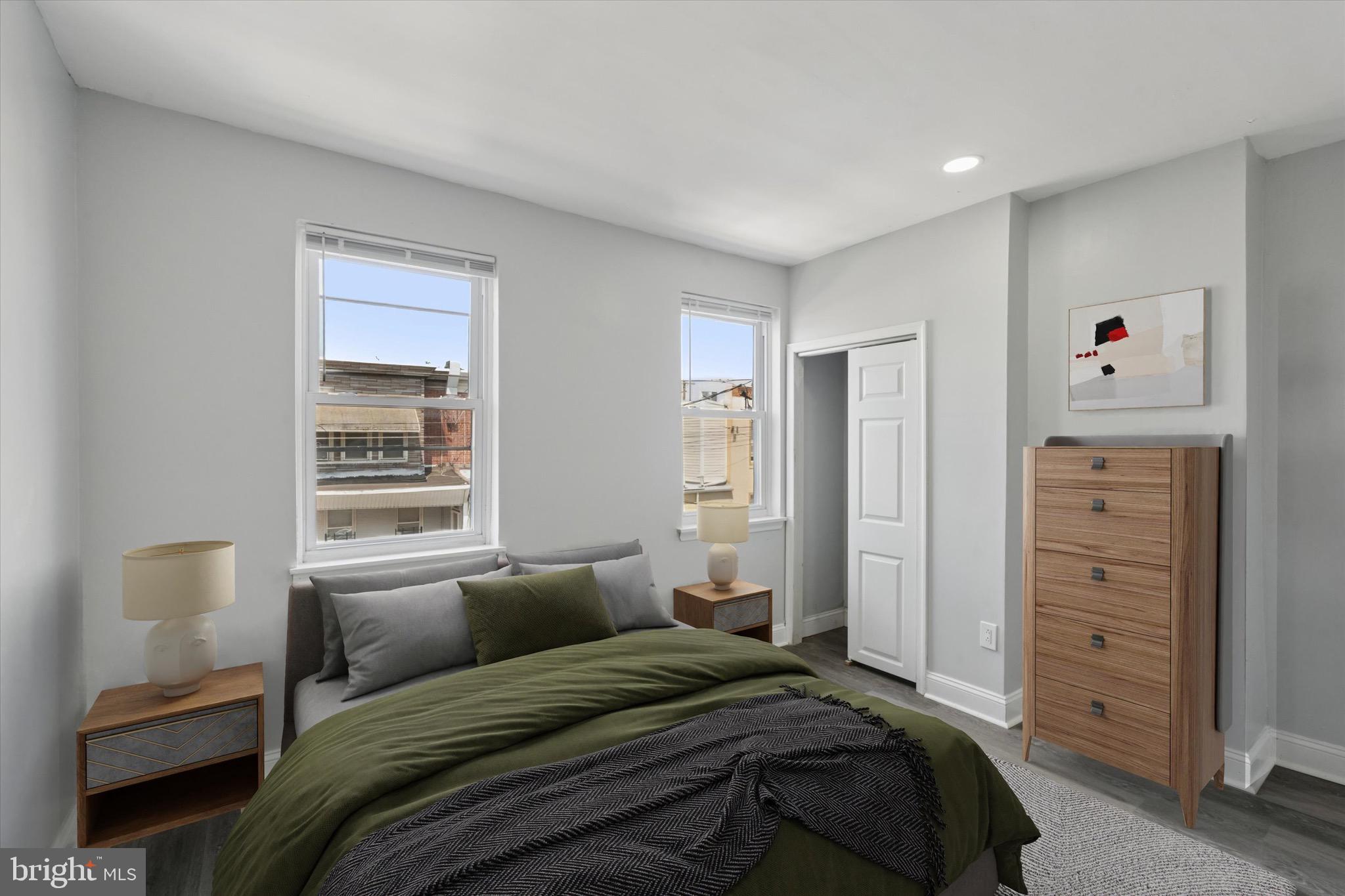 3097 Memphis Street Philadelphia, PA 19134 - Photo 3 of 18 a bedroom with a bed and a window