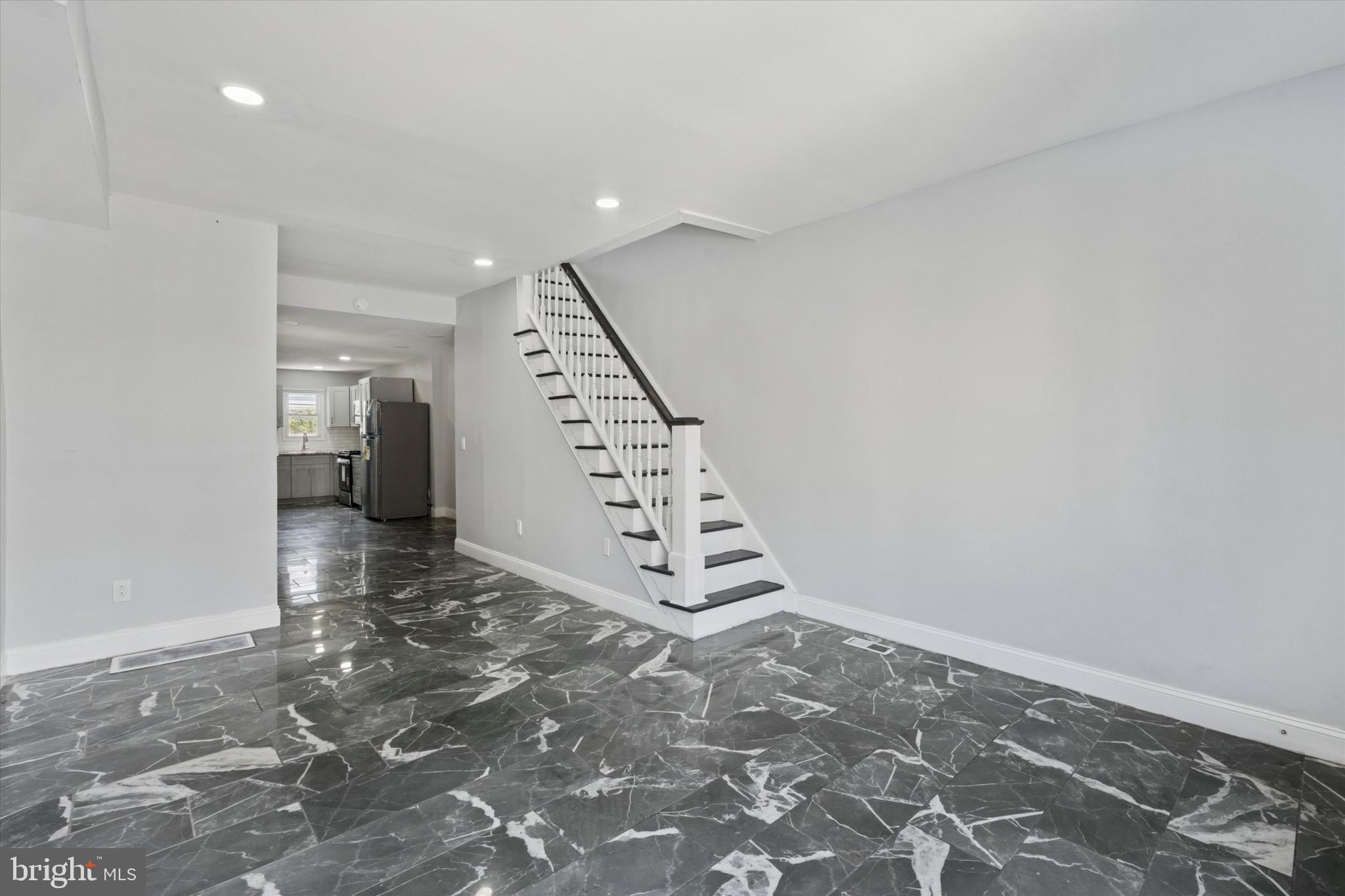 3097 Memphis Street Philadelphia, PA 19134 - Photo 6 of 18 wooden floor in an empty room with a gallery