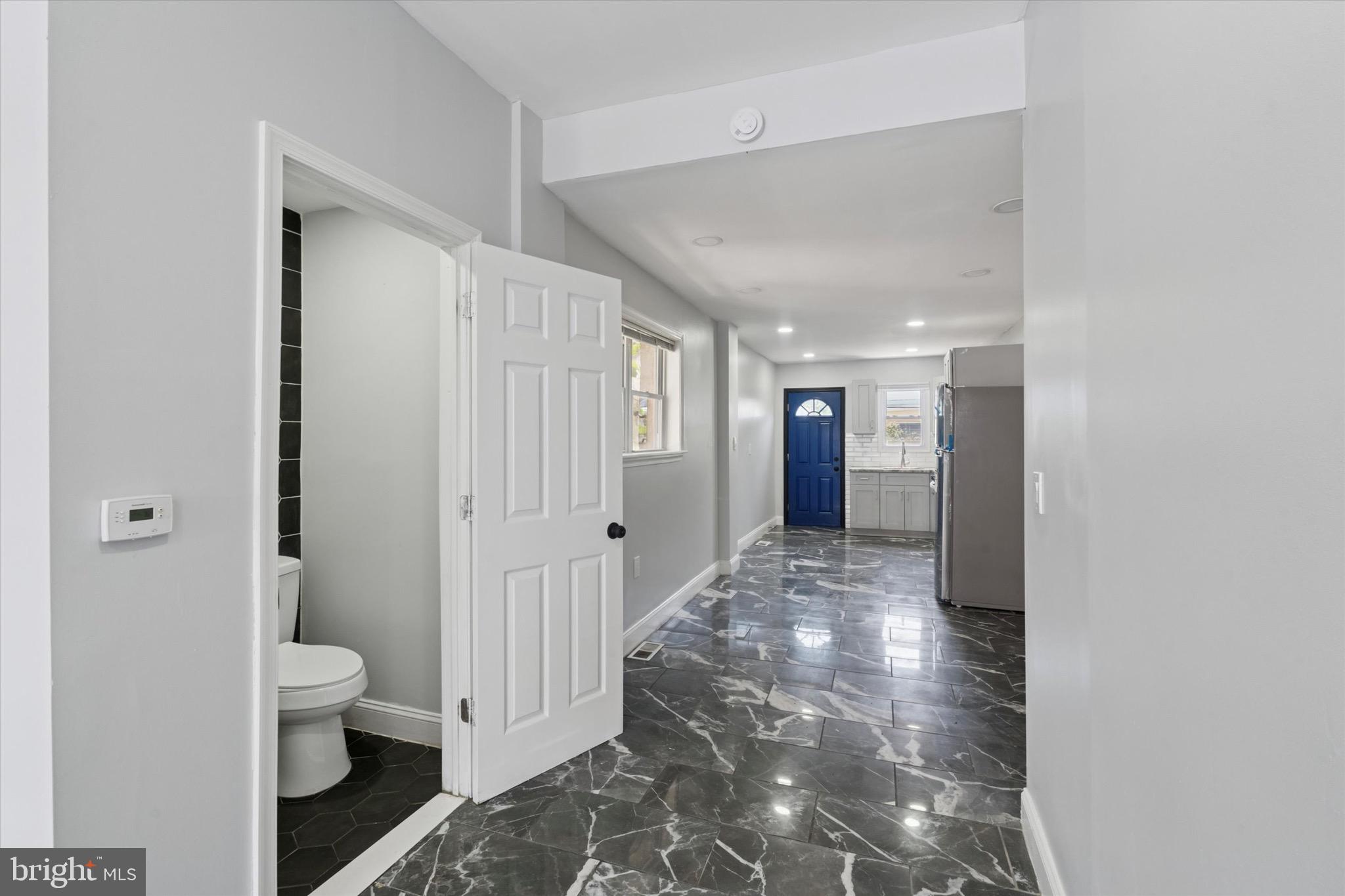 3097 Memphis Street Philadelphia, PA 19134 - Photo 8 of 18 a bathroom with a sink and a toilet