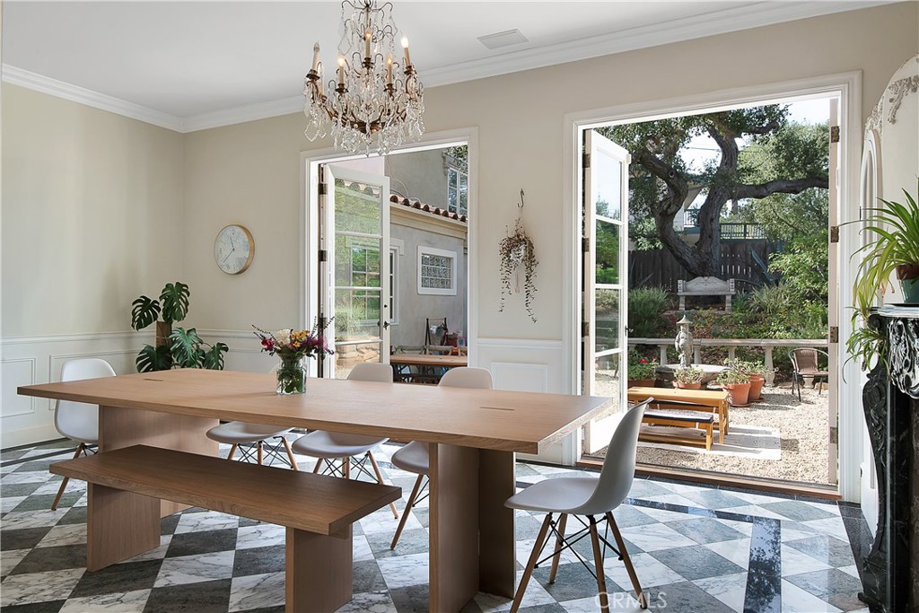 21149 Entrada Road Topanga, CA 90290 - Photo 17 of 39 a view of a dining room with furniture window and outside view