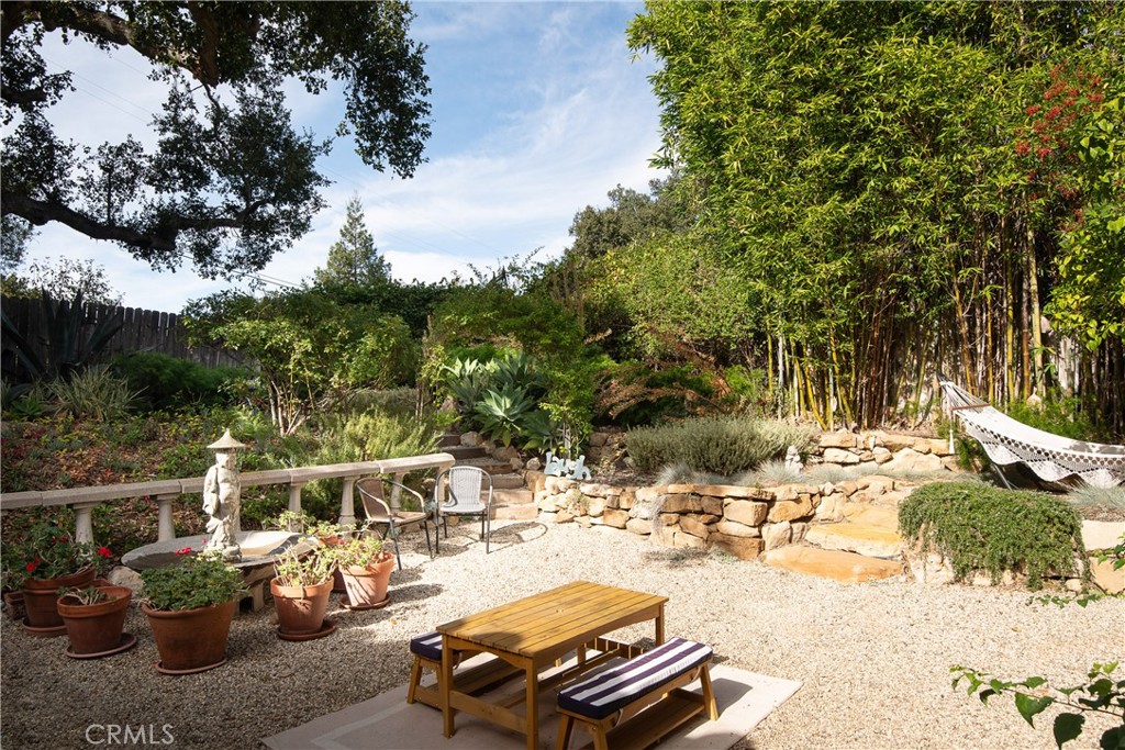 21149 Entrada Road Topanga, CA 90290 - Photo 27 of 39 a view of a swimming pool with a lounge chairs