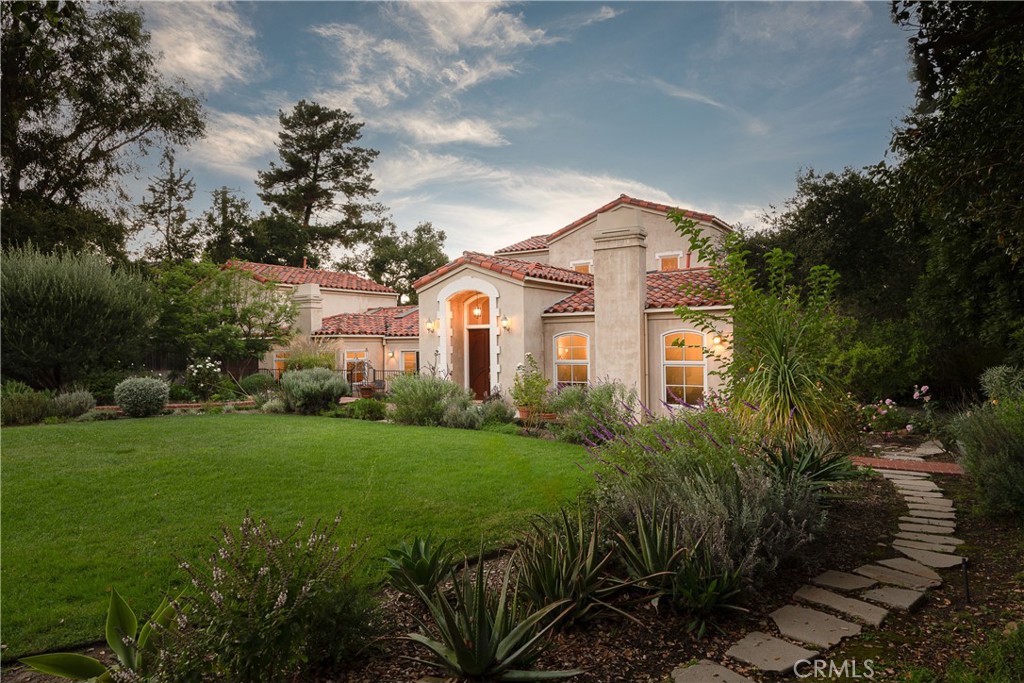 21149 Entrada Road Topanga, CA 90290 - Photo 4 of 39 a view of a big yard with plants and large trees