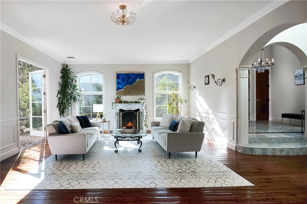 21149 Entrada Road Topanga, CA 90290 - Photo 7 of 39 a living room with furniture and a fireplace