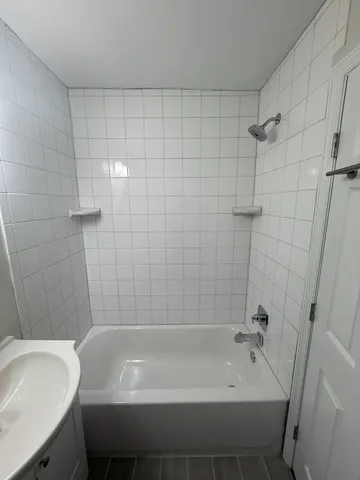 a bathroom with a sink and bathtub