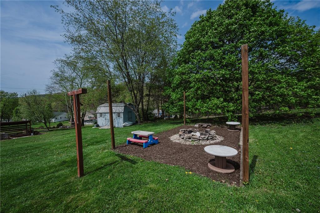 67 Prides Way Seward, PA 15954 - Photo 11 of 29 a view of a park with large trees and a pathway