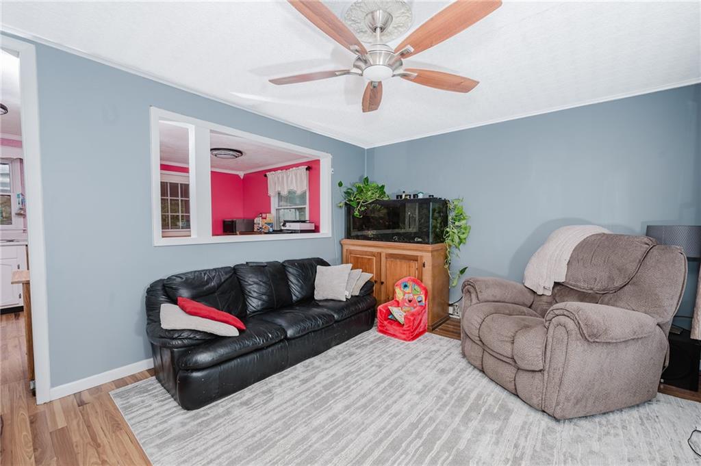 67 Prides Way Seward, PA 15954 - Photo 19 of 29 a living room with furniture and a wooden floor