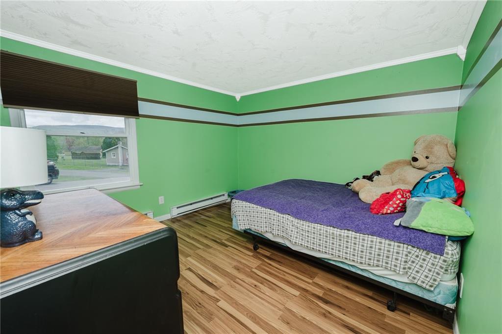 67 Prides Way Seward, PA 15954 - Photo 22 of 29 a bed room with a bed and a television