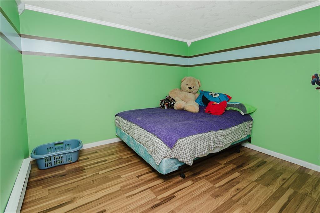 67 Prides Way Seward, PA 15954 - Photo 23 of 29 a bed sitting in a bedroom next to a window