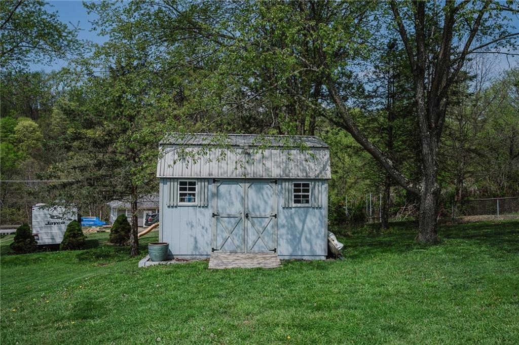 67 Prides Way Seward, PA 15954 - Photo 9 of 29 a view of a tiny house with a garden