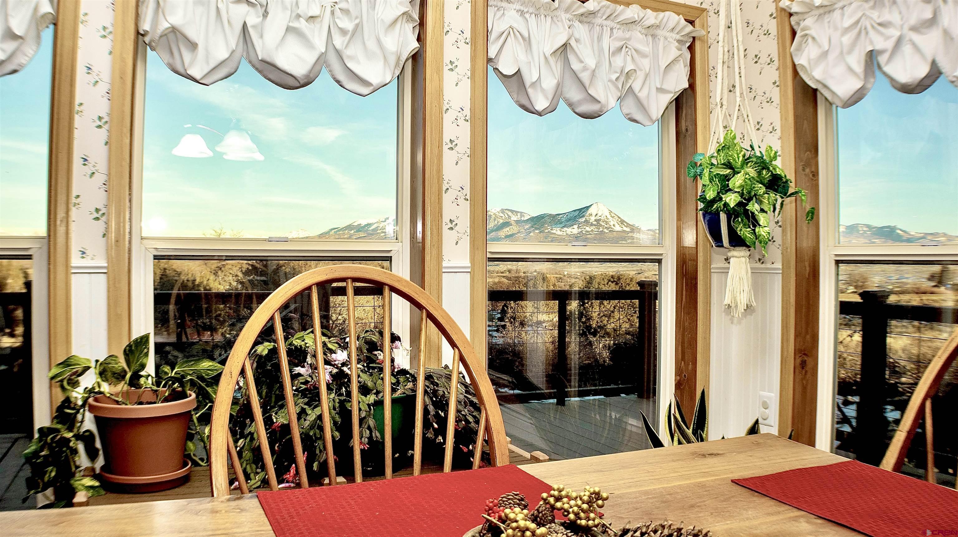 32179 L Road Hotchkiss, CO 81419 - Photo 15 of 45 a view of a balcony with chair and table