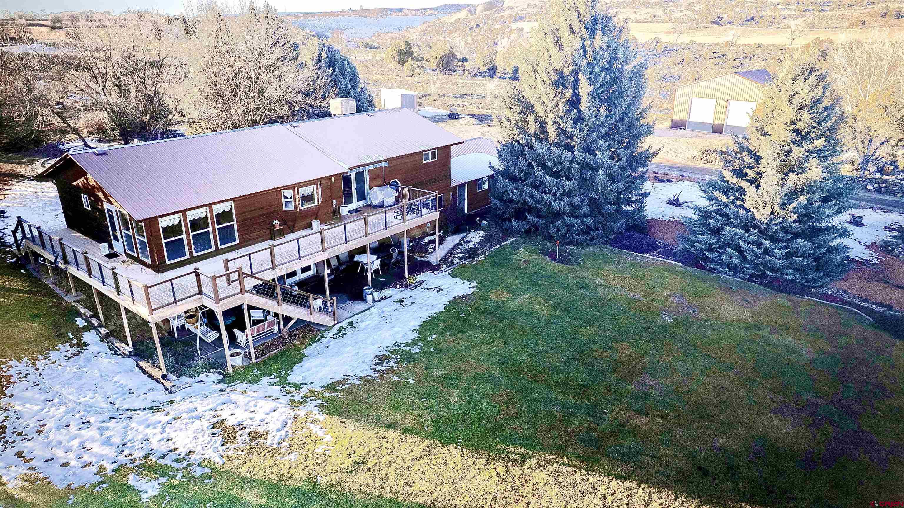 32179 L Road Hotchkiss, CO 81419 - Photo 2 of 45 a view of a house with a yard
