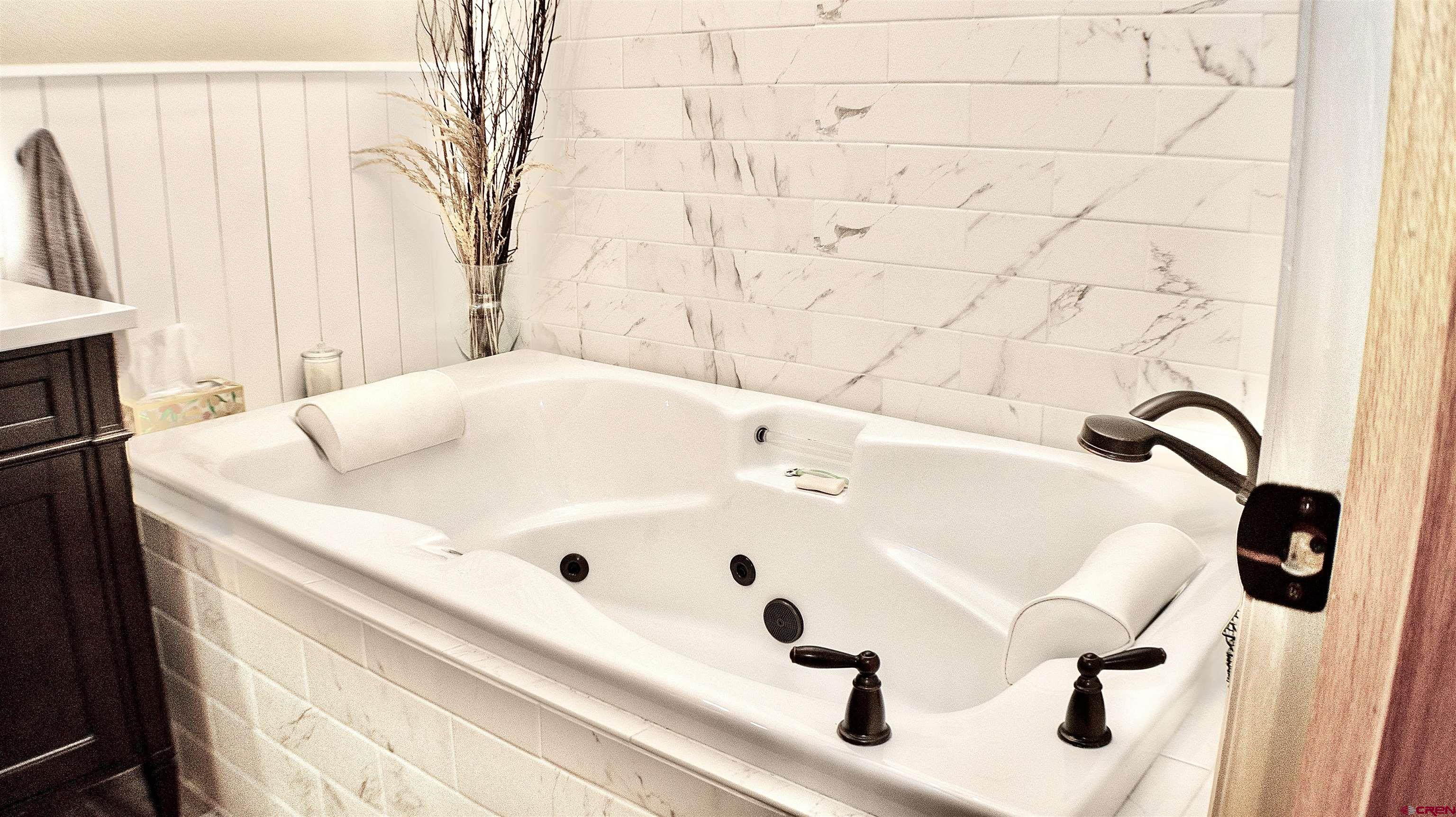 32179 L Road Hotchkiss, CO 81419 - Photo 22 of 45 a bathroom with a tub