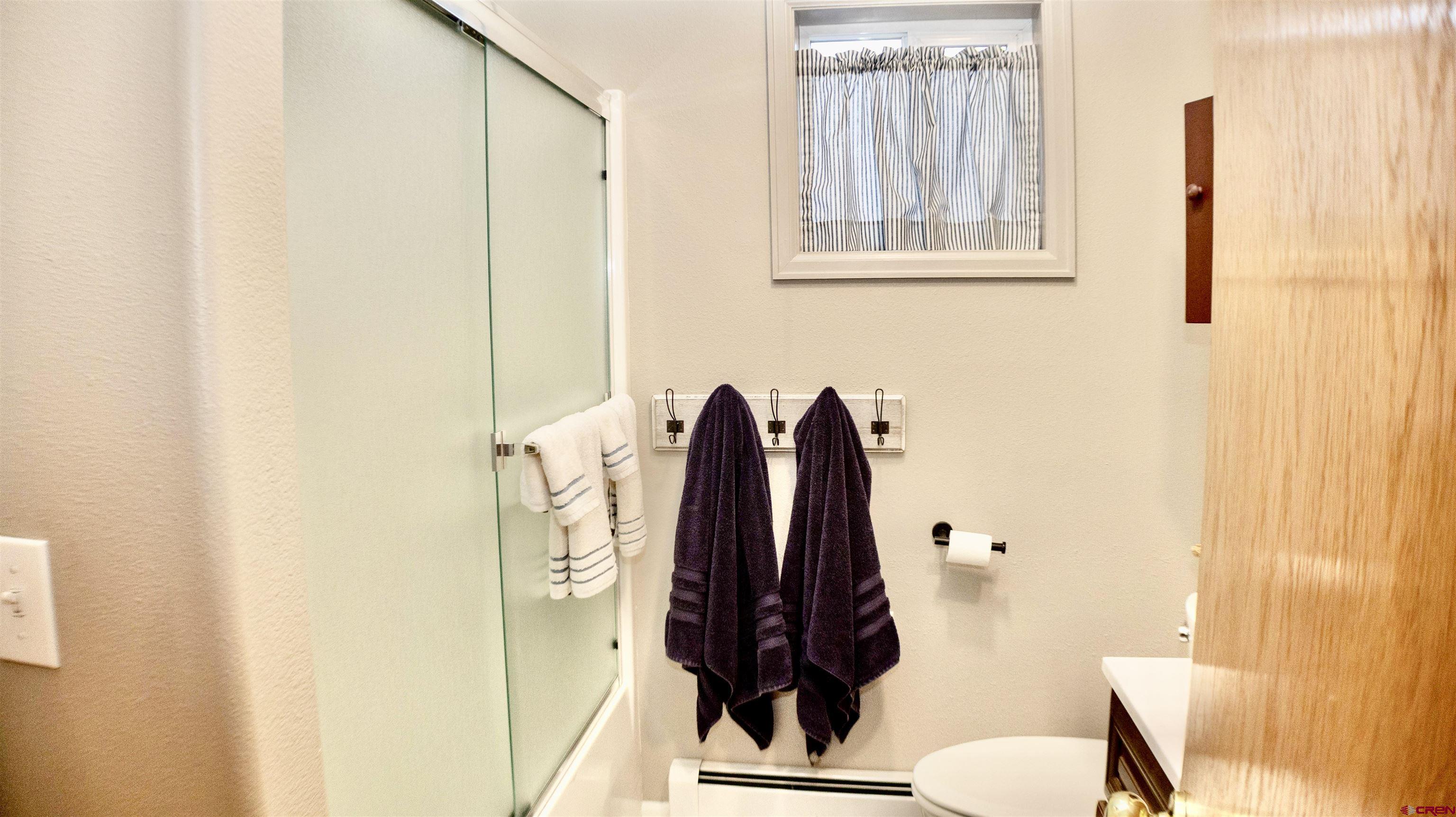 32179 L Road Hotchkiss, CO 81419 - Photo 25 of 45 a bathroom with a sink and a toilet
