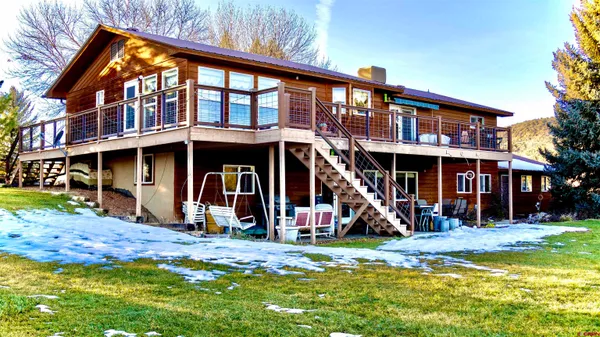 a front view of a house with a garage