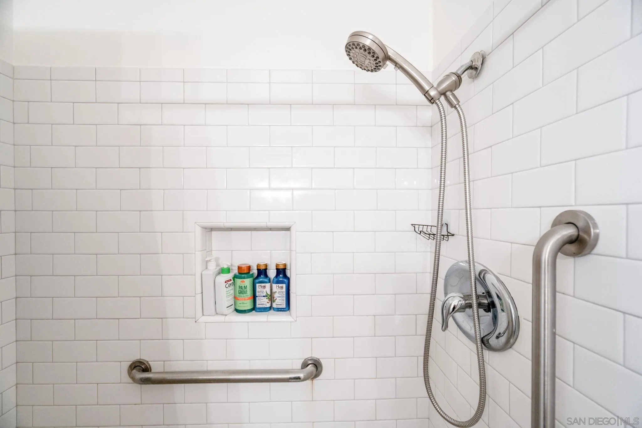 5553 Adobe Falls Road, Unit 1 San Diego, CA 92120 - Photo 18 of 21 a bathroom with a shower