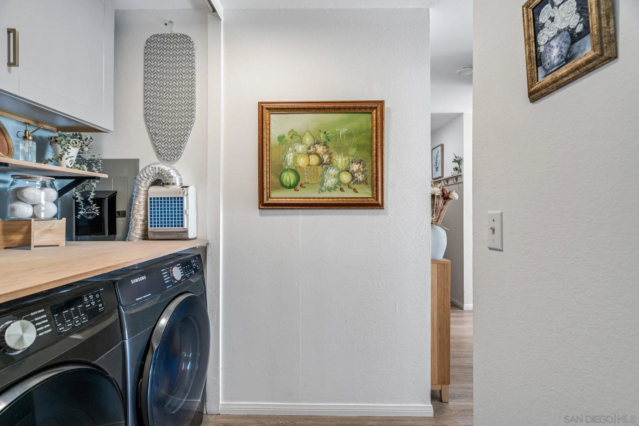 5553 Adobe Falls Road, Unit 1 San Diego, CA 92120 - Photo 19 of 21 a utility room with dryer and washer