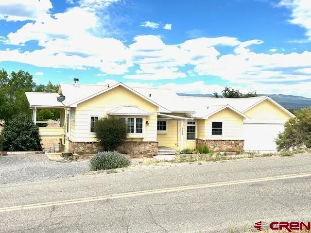 a view of house with a outdoor space