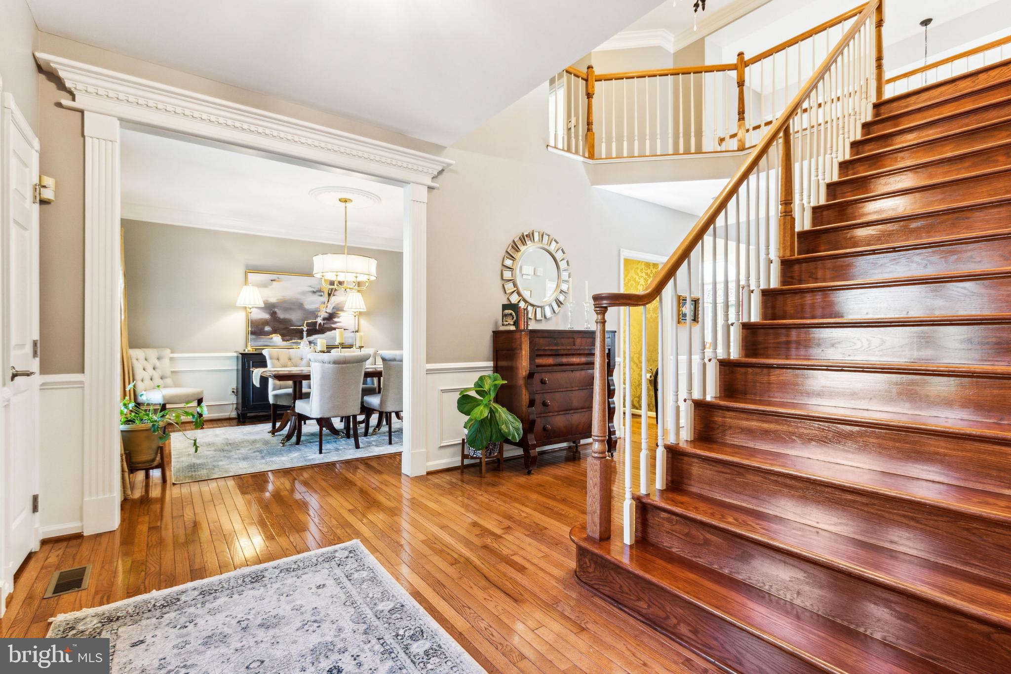 2922 Oak Shadow Drive Herndon, VA 20171 - Photo 11 of 60 Open Foyer with Beautiful wood Stairs and Molding