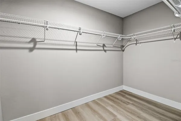 a view of a room with racks on the wall