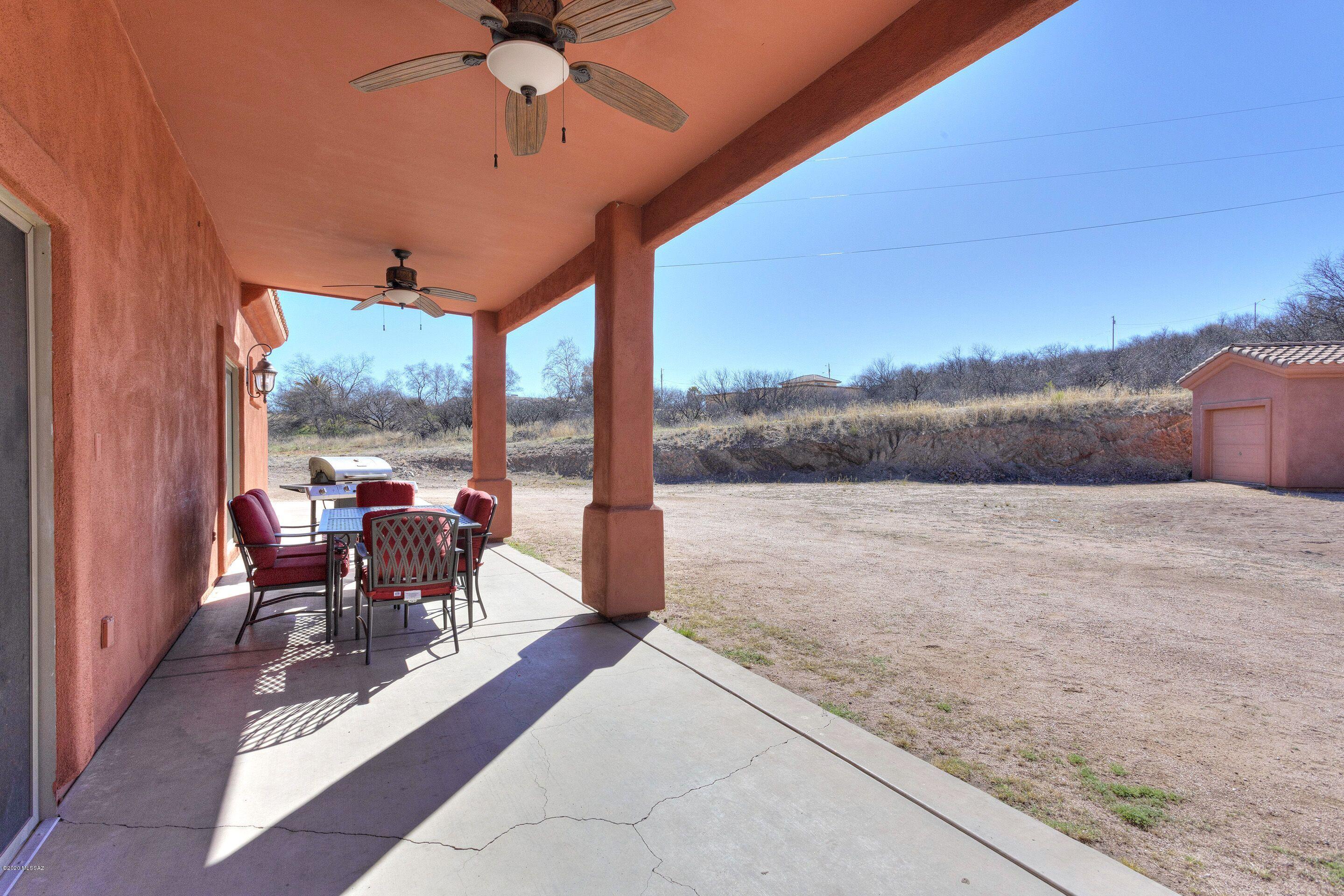 928 Paseo Cieneguita Rio Rico, AZ 85648 - Photo 24 of 27 a living room with furniture