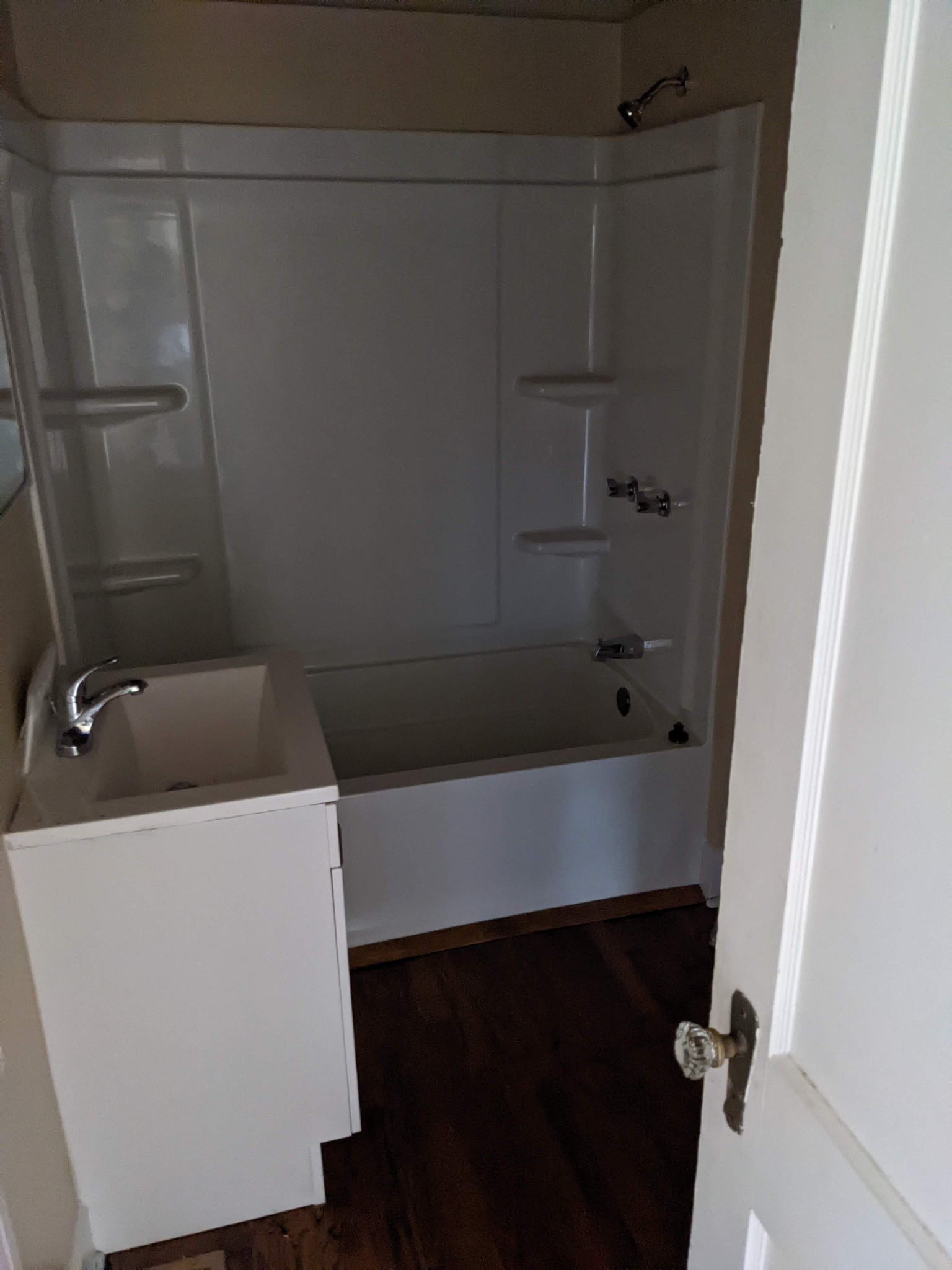 1289 Hunters Point Pike Lebanon, TN 37087 - Photo 13 of 15 a bathroom with a bathtub and shower