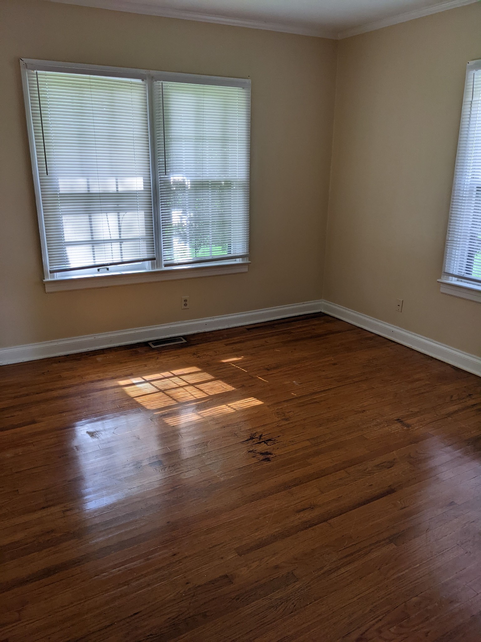 1289 Hunters Point Pike Lebanon, TN 37087 - Photo 14 of 15 a view of an empty room with wooden floor and a window