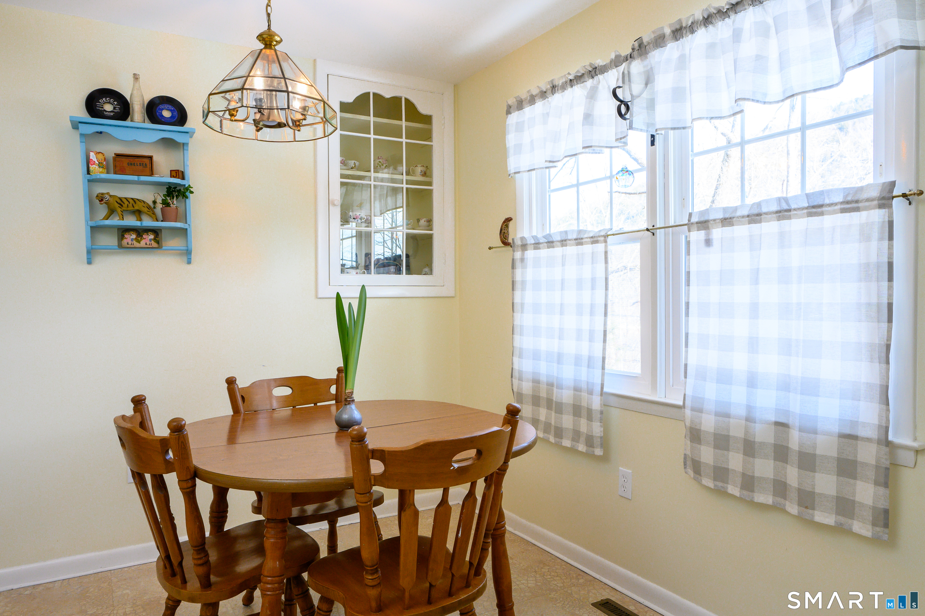 76 South Kent Road Kent, CT 06757 - Photo 8 of 20 a view of a dining room with furniture and chandelier