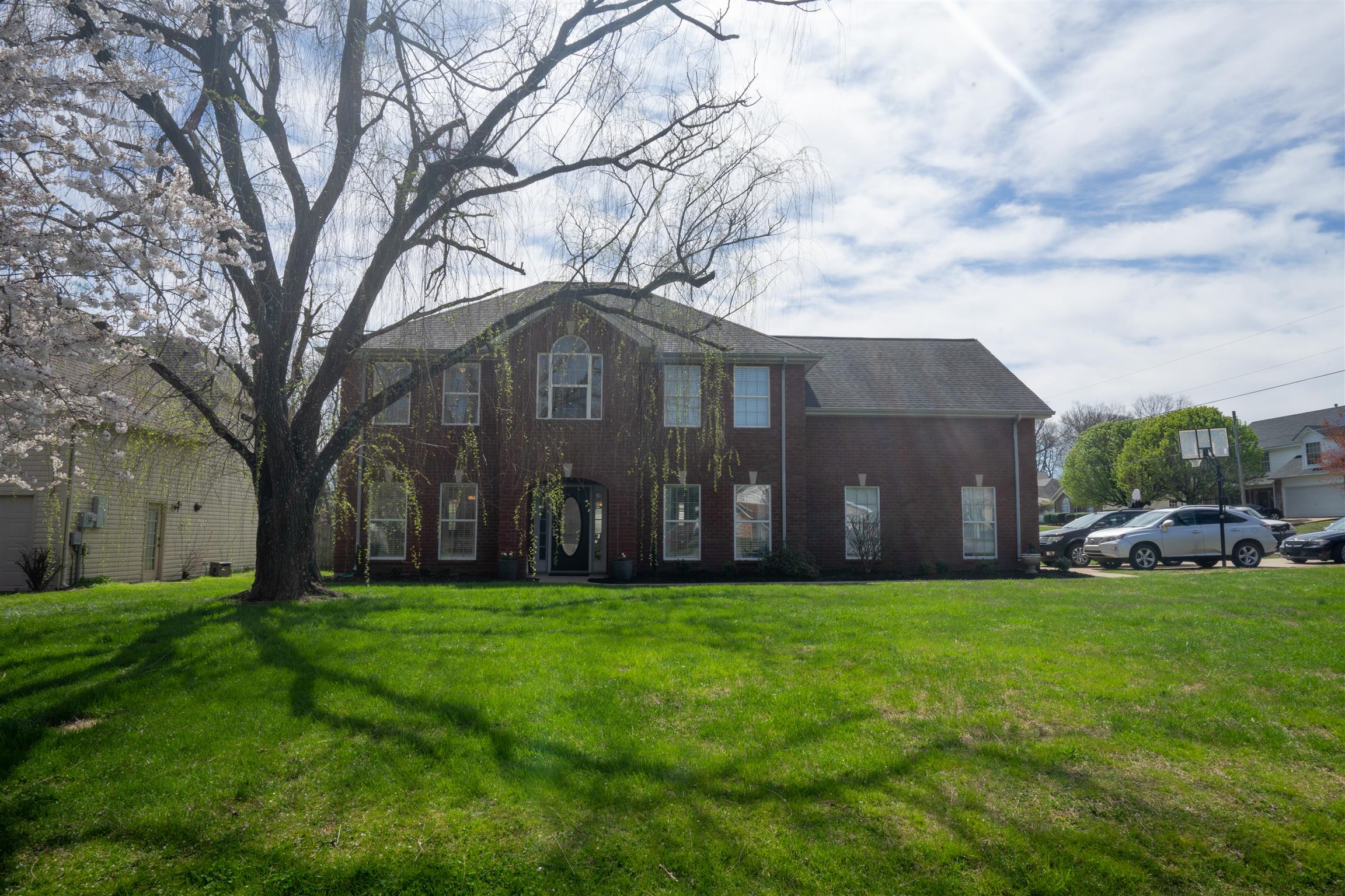 4002 Amber Way Spring Hill, TN 37174 - Photo 2 of 21 a view of a house with a yard