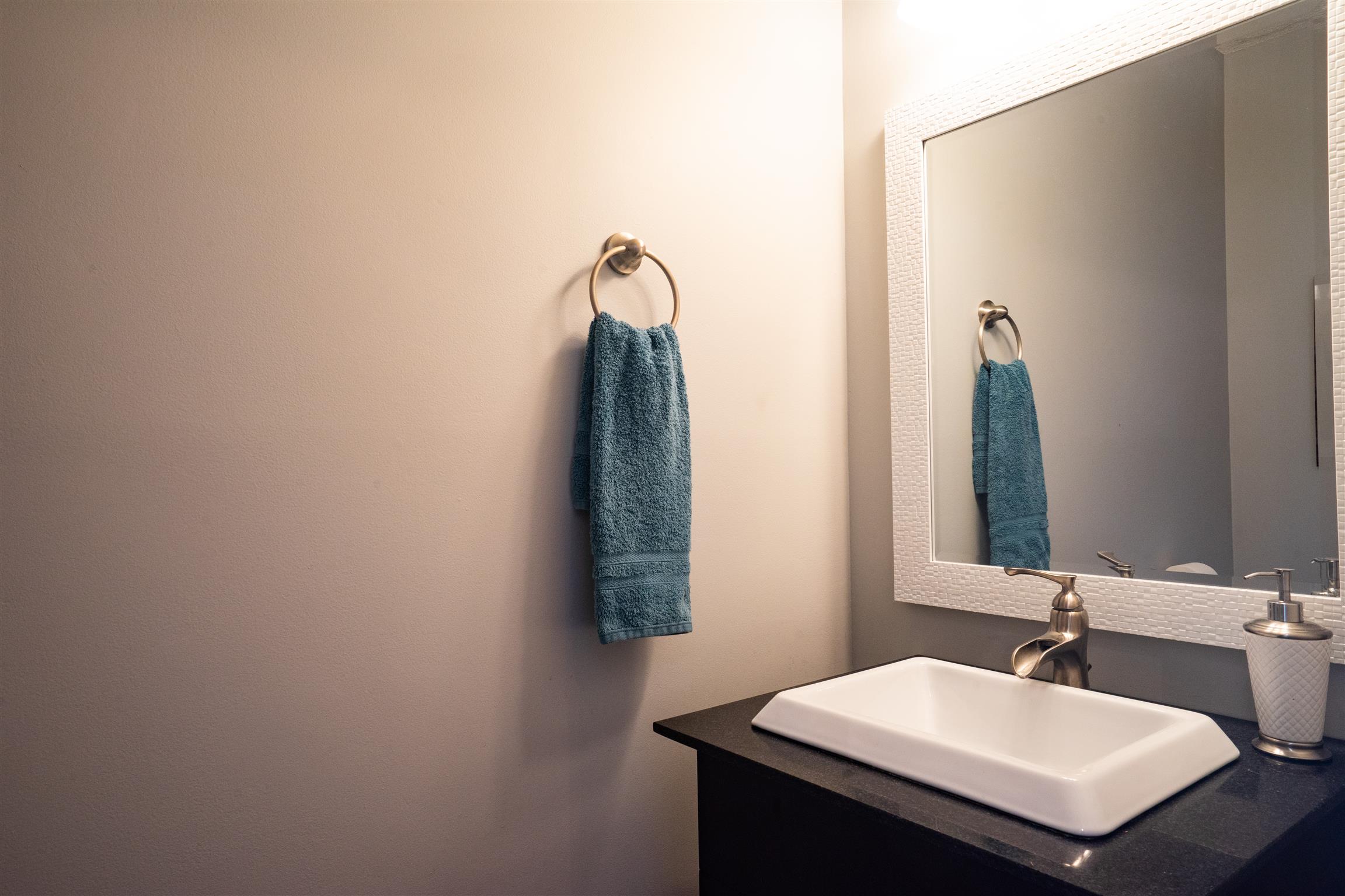 4002 Amber Way Spring Hill, TN 37174 - Photo 12 of 21 a bathroom with a sink and a mirror