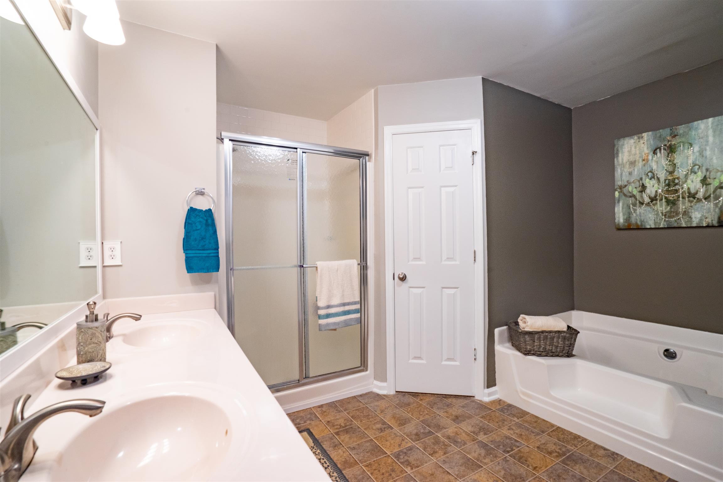 4002 Amber Way Spring Hill, TN 37174 - Photo 15 of 21 a bedroom with a bed and a couch