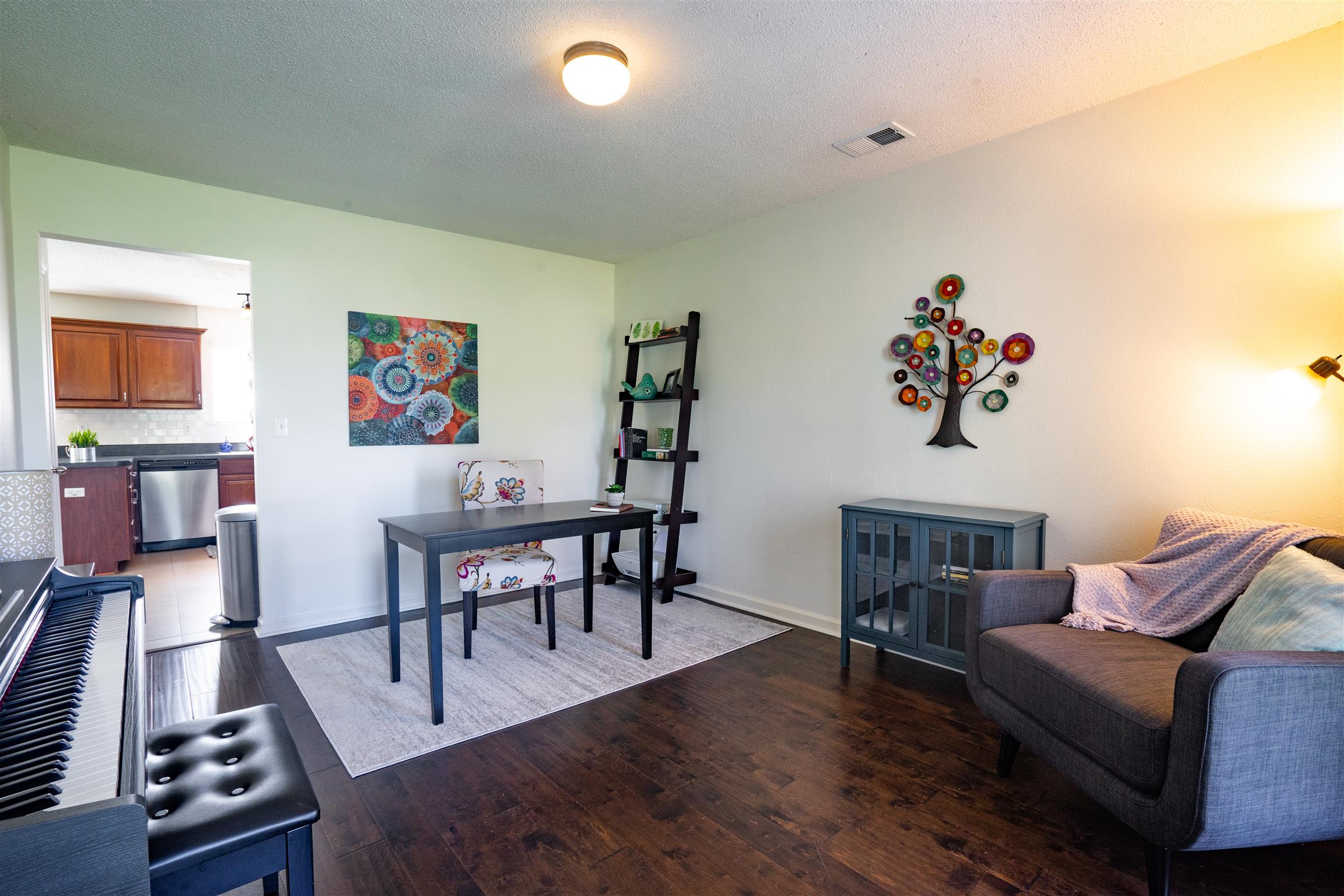 4002 Amber Way Spring Hill, TN 37174 - Photo 5 of 21 a living room with furniture and a flat screen tv