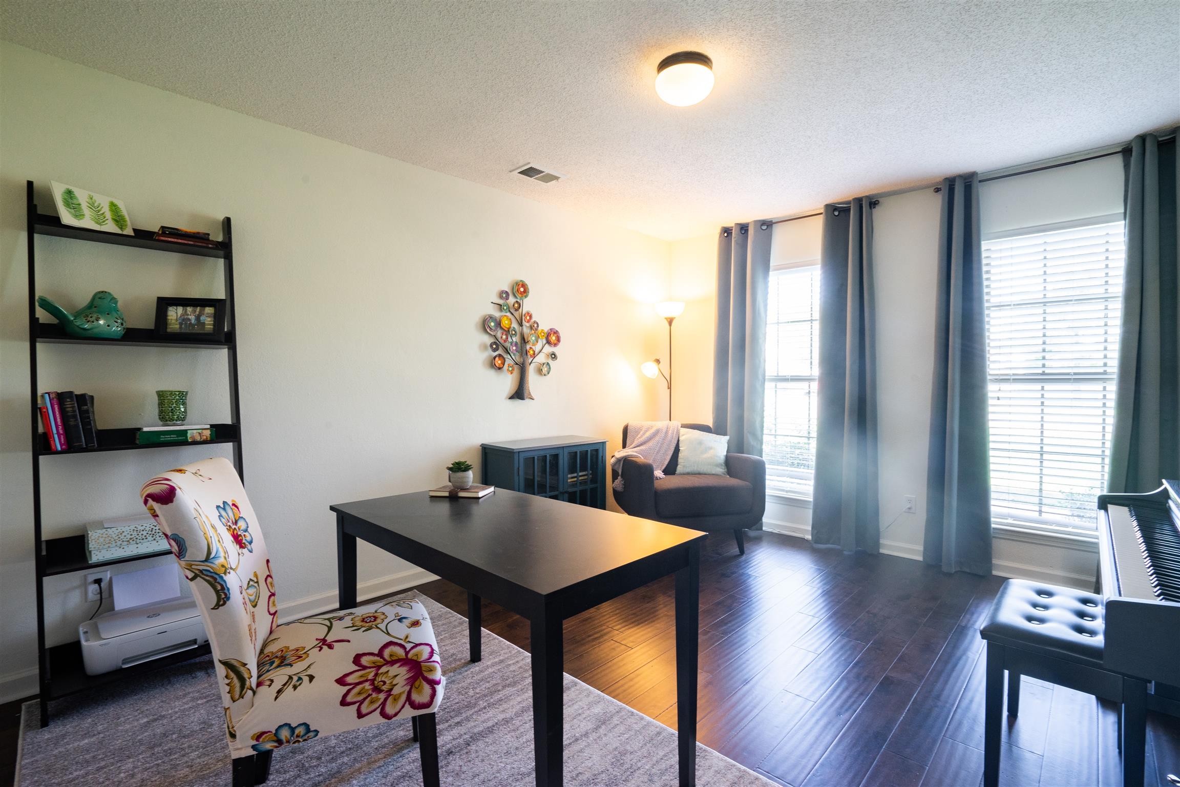 4002 Amber Way Spring Hill, TN 37174 - Photo 6 of 21 a living room with furniture and wooden floor